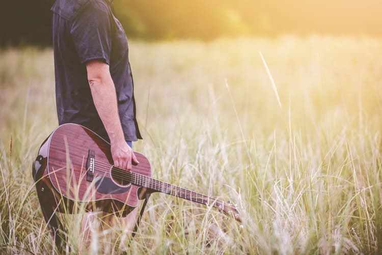 man holding a guitar