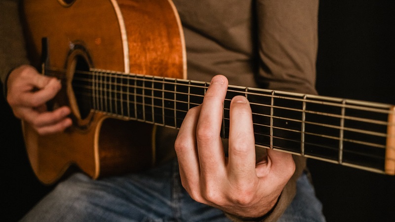 thin neck acoustic guitar